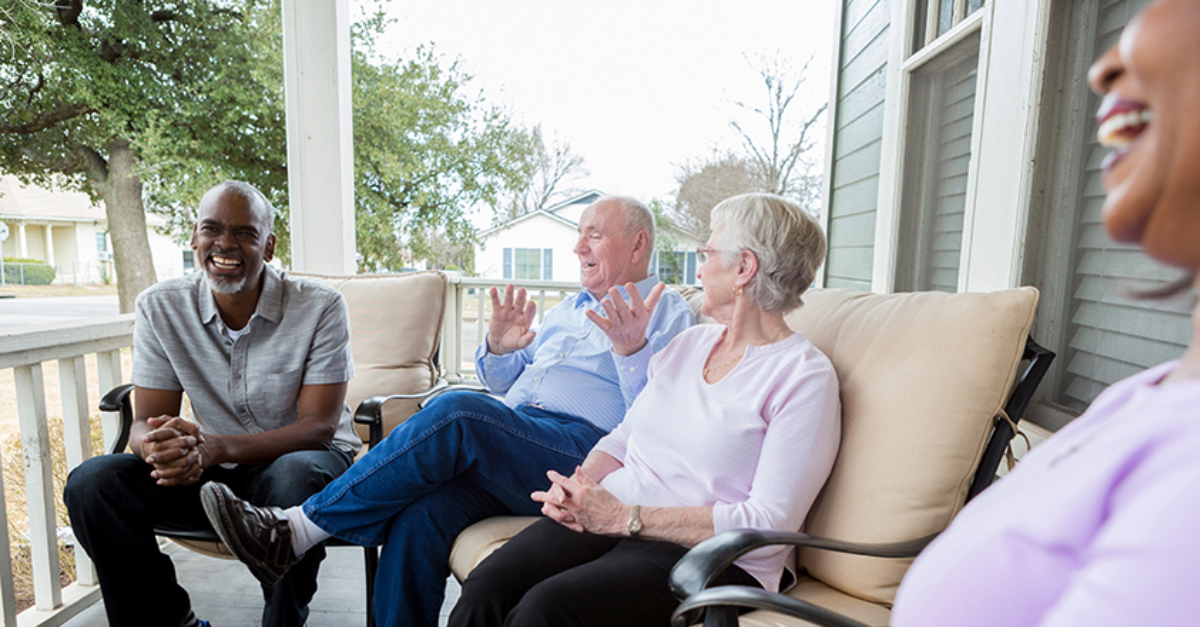 Elderly couple with real estate agent